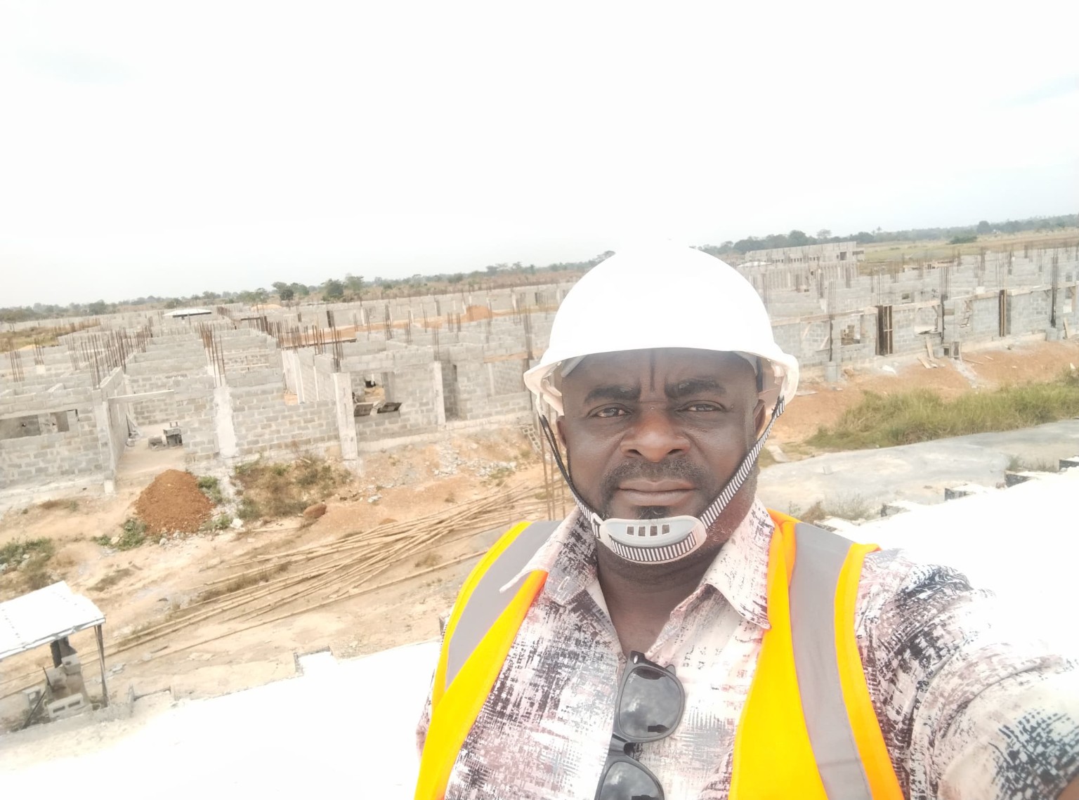 Cone Multi Ventures representative inspecting a construction project