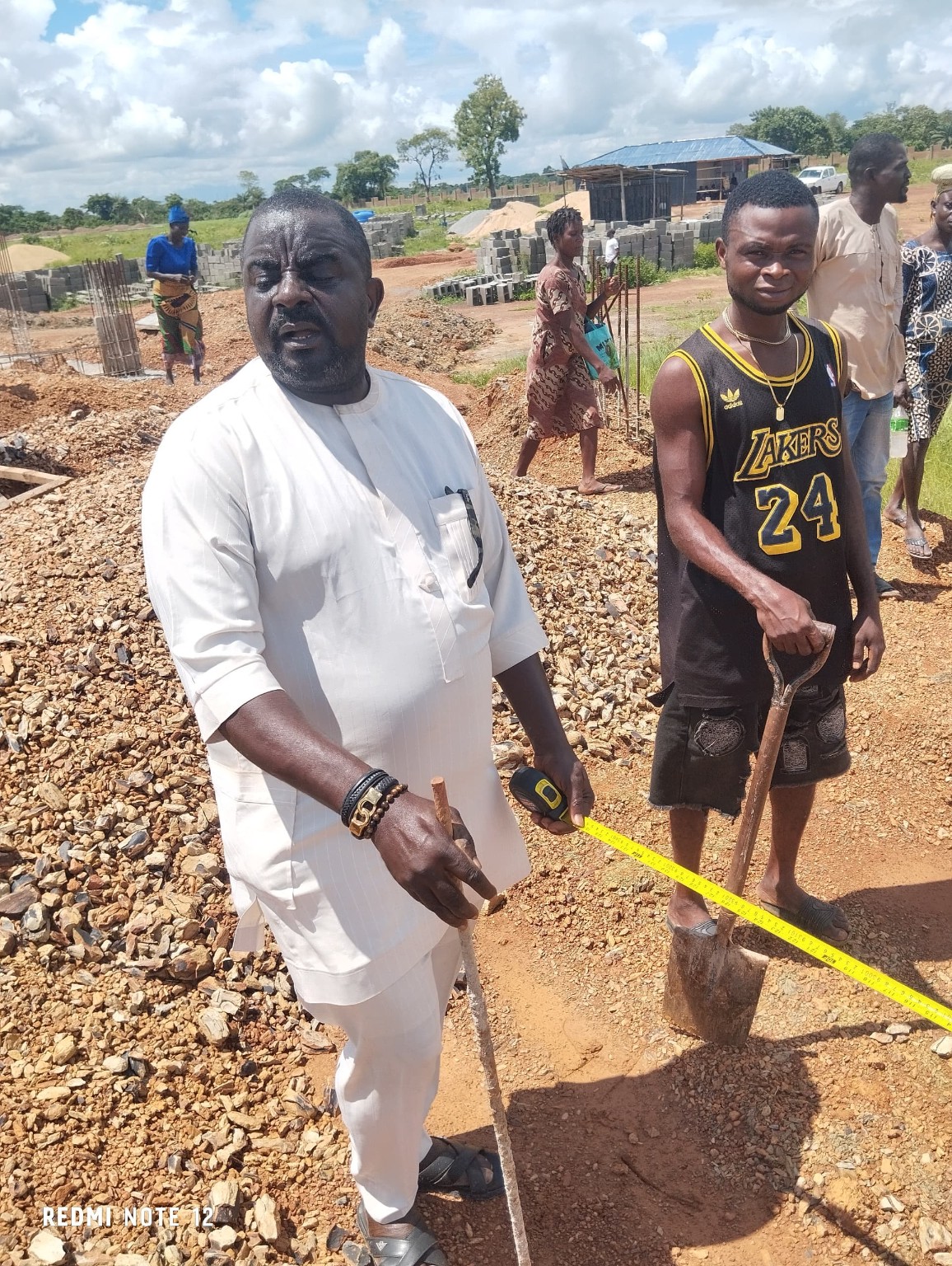 Cone Multi Ventures representative measuring at a construction site